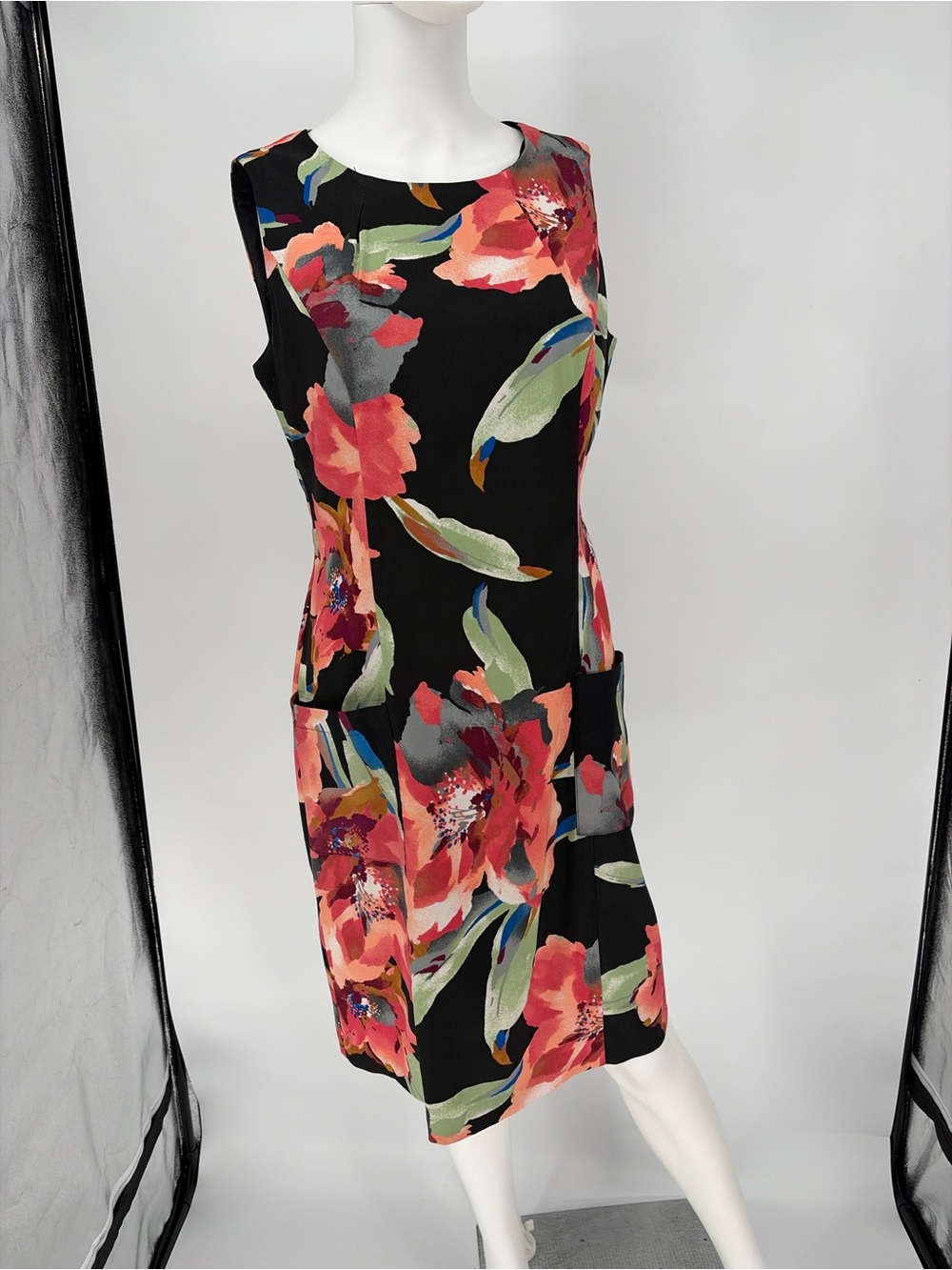 Women’s black dress with peach flowers